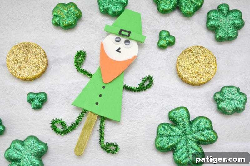 Craft a Lucky Leprechaun from Popsicle Sticks for St Patricks Day 2 A cheerful completed Popsicle Stick Leprechaun puppet, showcasing a fun and easy St. Patrick's Day craft for children.
