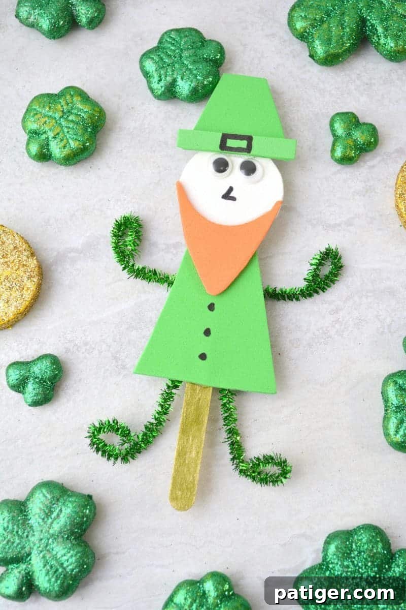 Craft a Lucky Leprechaun from Popsicle Sticks for St Patricks Day 3 A vibrant close-up of a finished Popsicle Stick Leprechaun puppet, ready for imaginative play and St. Patrick's Day celebrations.