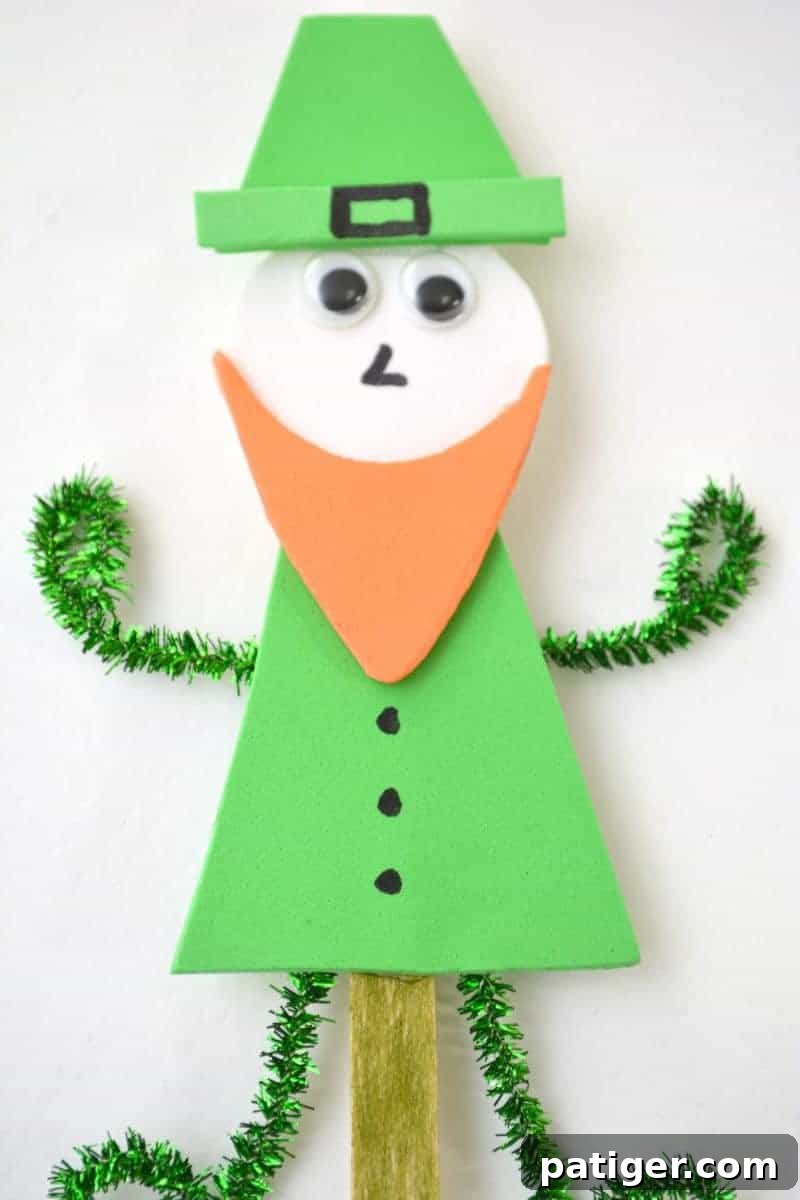 Craft a Lucky Leprechaun from Popsicle Sticks for St Patricks Day 17 The final details are added to the Popsicle Stick Leprechaun: a sharpie buckle on the hat and three black buttons down the shirt.