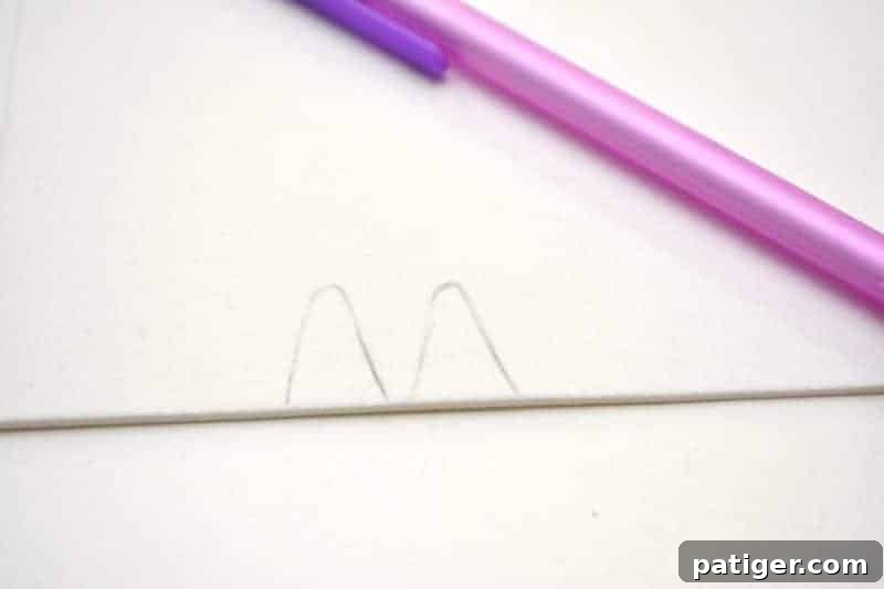 Drawing the smaller, delicate white inner ear shapes on craft foam for the Easter Bunny Pudding Cups, adding a crucial detail to the bunny's visual appeal.