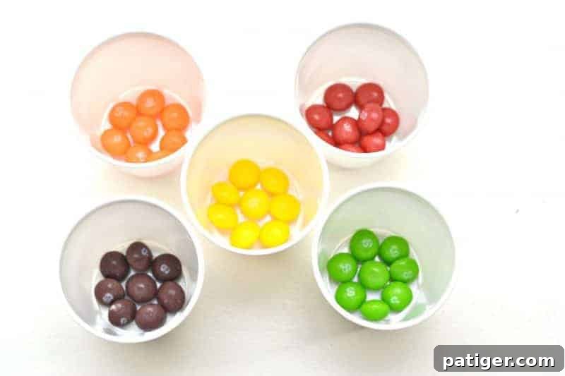 Looking for a fun Easter kids activity?! How about making 2-ingredient watercolor paint with Skittles candies?! See how to make skittles paints and download a free printable Easter egg coloring page.