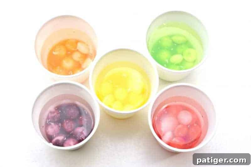 Looking for a fun Easter kids activity?! How about making 2-ingredient watercolor paint with Skittles candies?! See how to make skittles paints and download a free printable Easter egg coloring page.