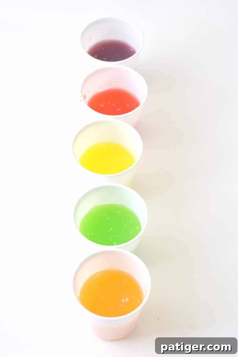 Looking for a fun Easter kids activity?! How about making 2-ingredient watercolor paint with Skittles candies?! See how to make skittles paints and download a free printable Easter egg coloring page.