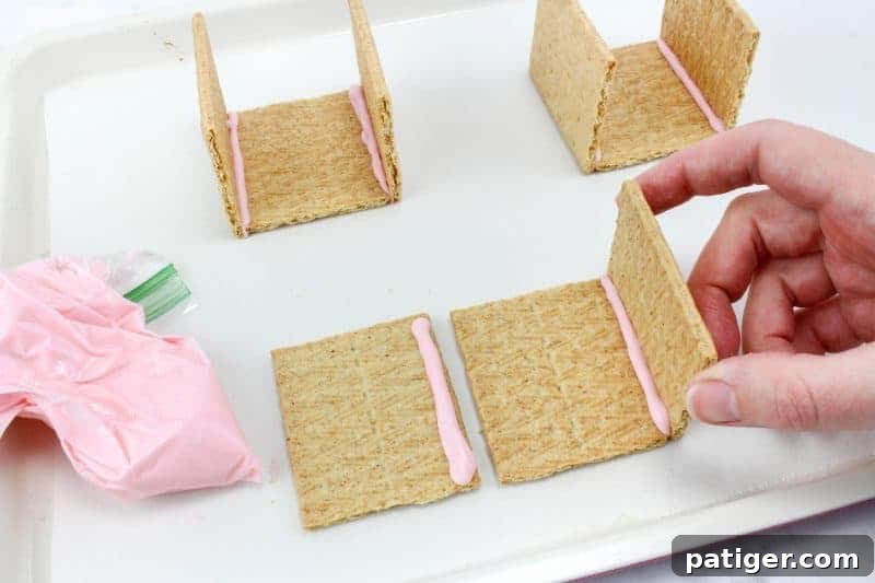 Peeps chicks houses are a fun no bake Easter treat perfect for the kids this Spring season. Made using Peeps Chicks, graham crackers, egg candies, and edible grass, this cute Easter recipe is perfect to make with the little ones.