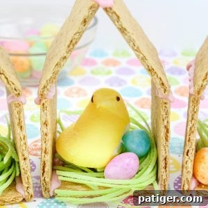 Peeps chicks houses are a fun no bake Easter treat perfect for the kids this Spring season. Made using Peeps Chicks, graham crackers, egg candies, and edible grass, this cute Easter recipe is perfect to make with the little ones.