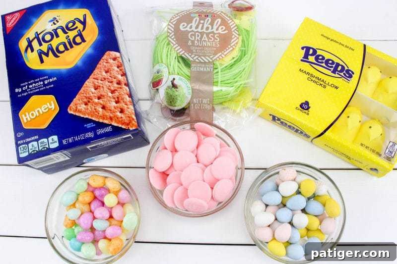 Peeps chicks houses are a fun no bake Easter treat perfect for the kids this Spring season. Made using Peeps Chicks, graham crackers, egg candies, and edible grass, this cute Easter recipe is perfect to make with the little ones.