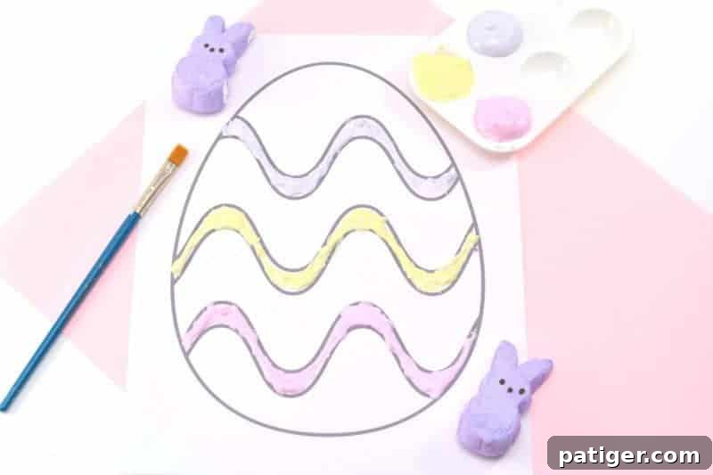 Happy child displaying colorful Peeps puffy paint art, a fun and easy DIY Easter craft activity.