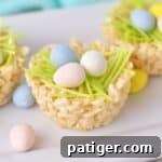 Rice krispie nests with mini eggs and edible grass.