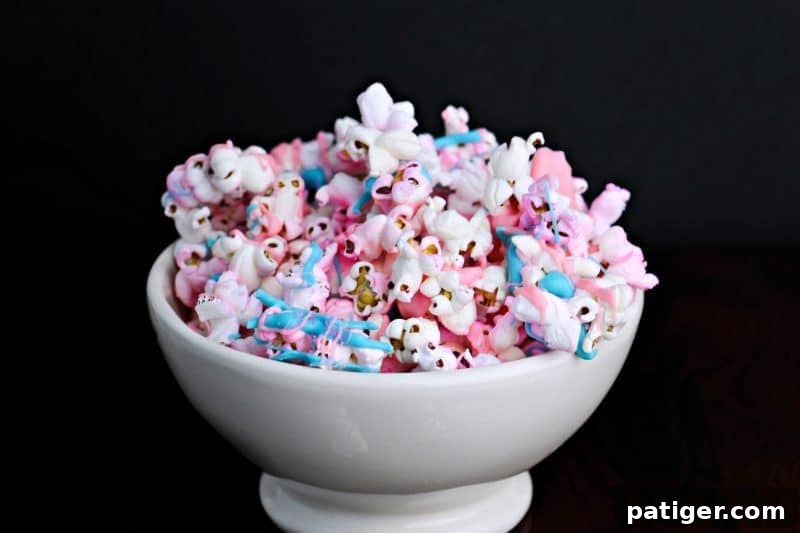 Unicorn popcorn, a vibrant and easy treat perfect for unicorn themed parties and sleepovers.