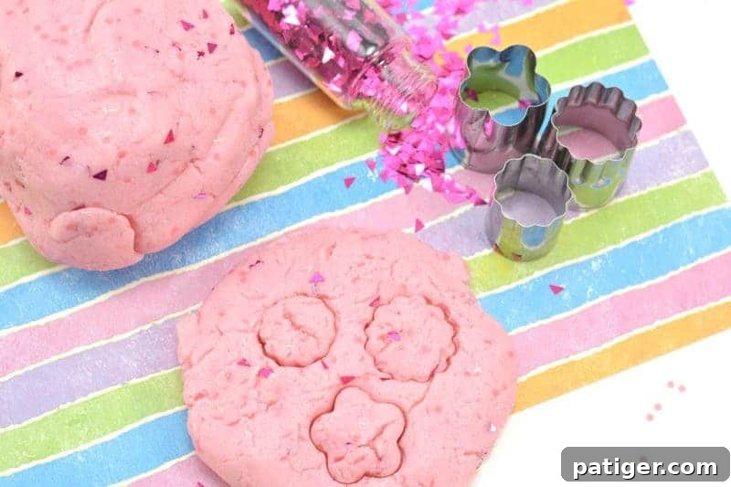 Pink Princess Sweet Dough Magic 2 Adorable pink princess playdough shimmering with edible glitter, ready for creative play.