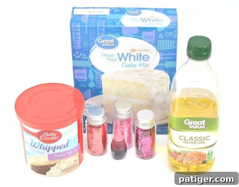 Pink Princess Sweet Dough Magic 4 Collection of ingredients for pink princess playdough: cake mix, icing, olive oil, pink food coloring, and edible glitter.