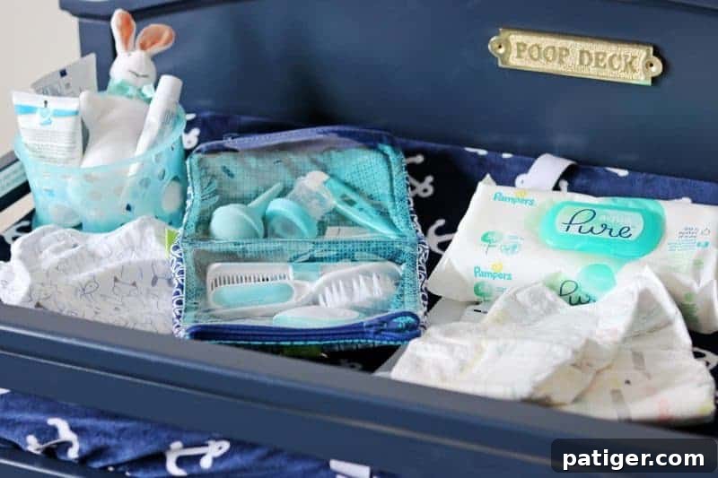 Create the Perfect Diaper Changing Station 7 A well-equipped diaper changing station, including a diaper pail, essential for managing soiled diapers and maintaining hygiene.