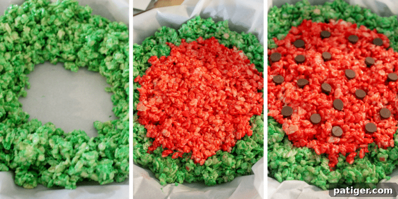 Watermelon Rice Krispies Treats in a round cake pan, showing the green rind and red center.