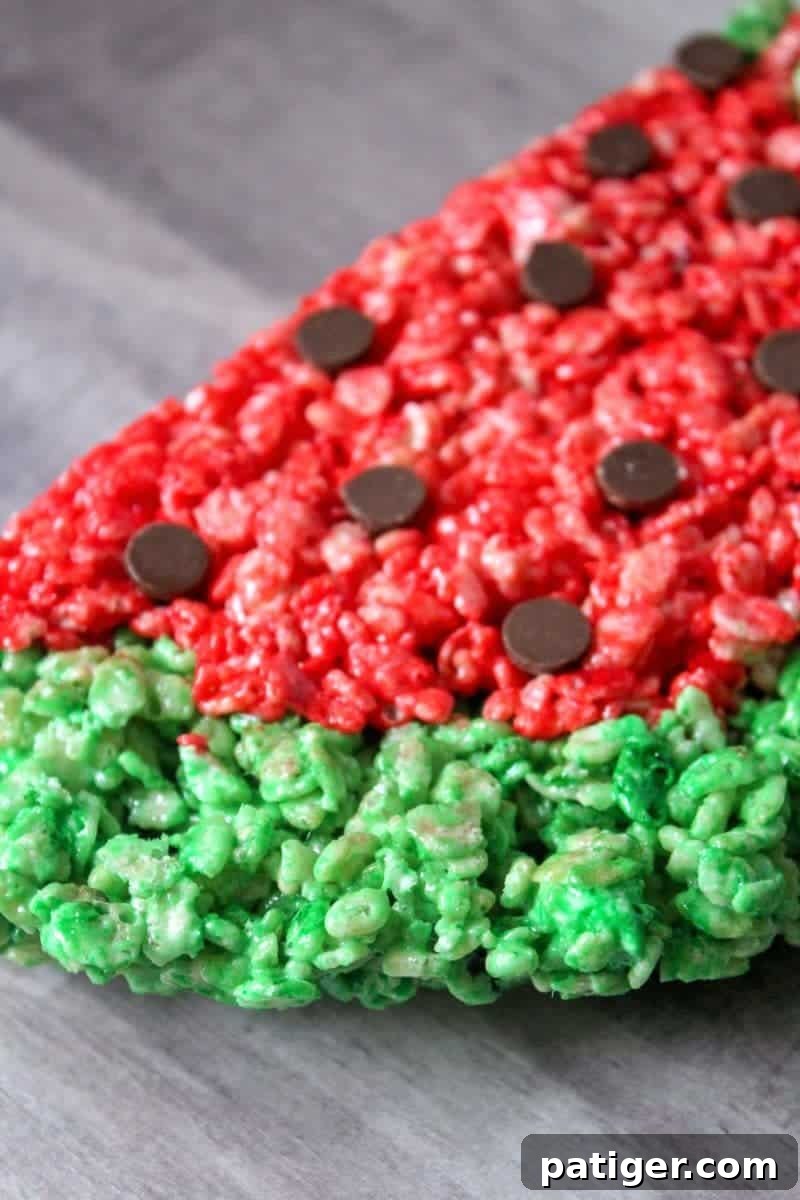 Watermelon Rice Krispies Treats cut into wedges, ready to serve.