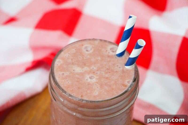 Delicious pineapple cherry smoothie recipe made with frozen pineapple, cherries, kale, almond milk, yogurt, and vanilla extract. A tasty and refreshing treat for kids or grown-ups!