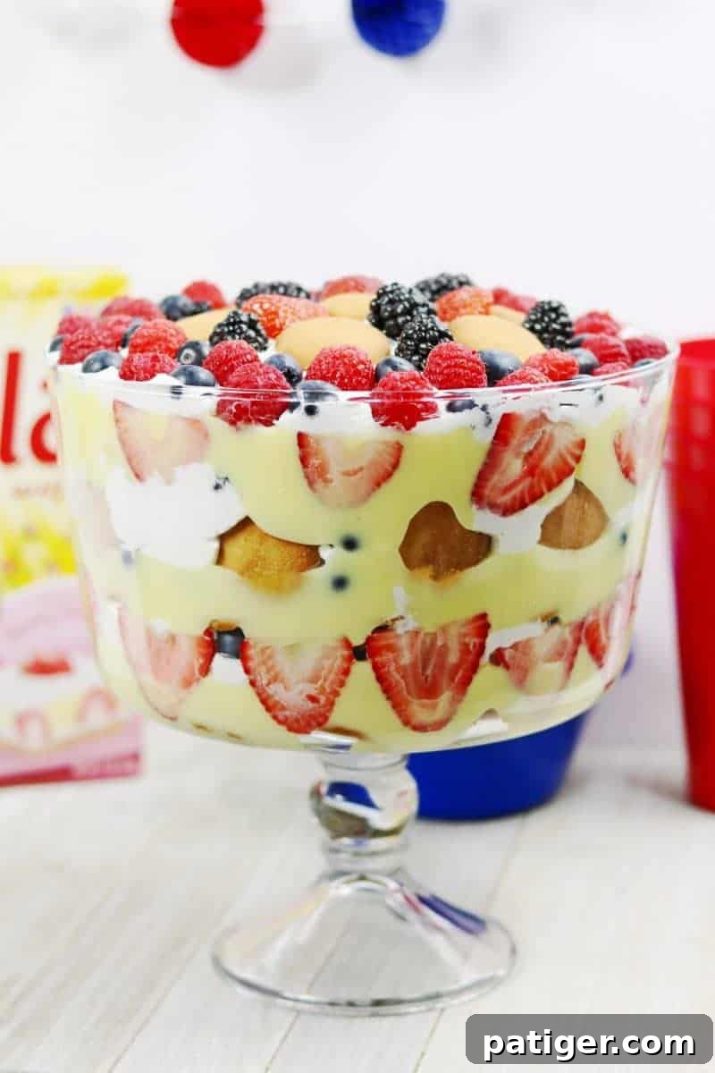 Stars and Stripes Berry Trifle 2 A vibrant red, white, and blue Patriotic Berry Trifle, ideal as a no-bake summer dessert for 4th of July celebrations.