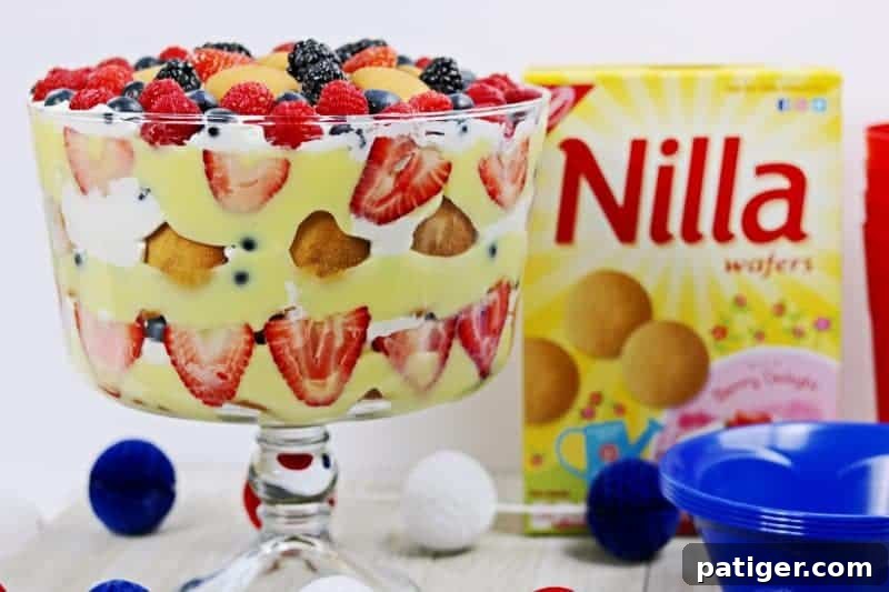 Stars and Stripes Berry Trifle 10 A beautifully layered Patriotic Berry Trifle, a perfect no-bake dessert for summer entertaining.