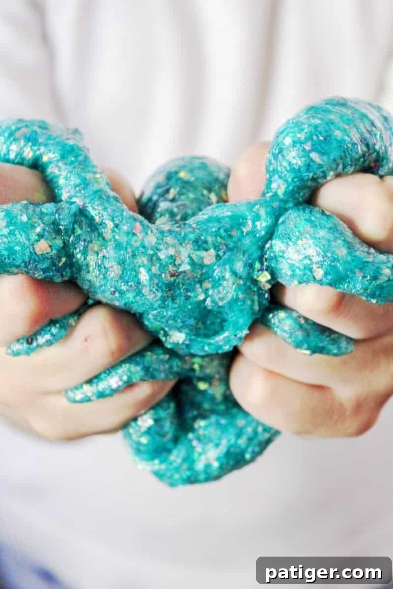 Close-up of vibrant teal mermaid slime, a delightful borax-free craft idea for kids.