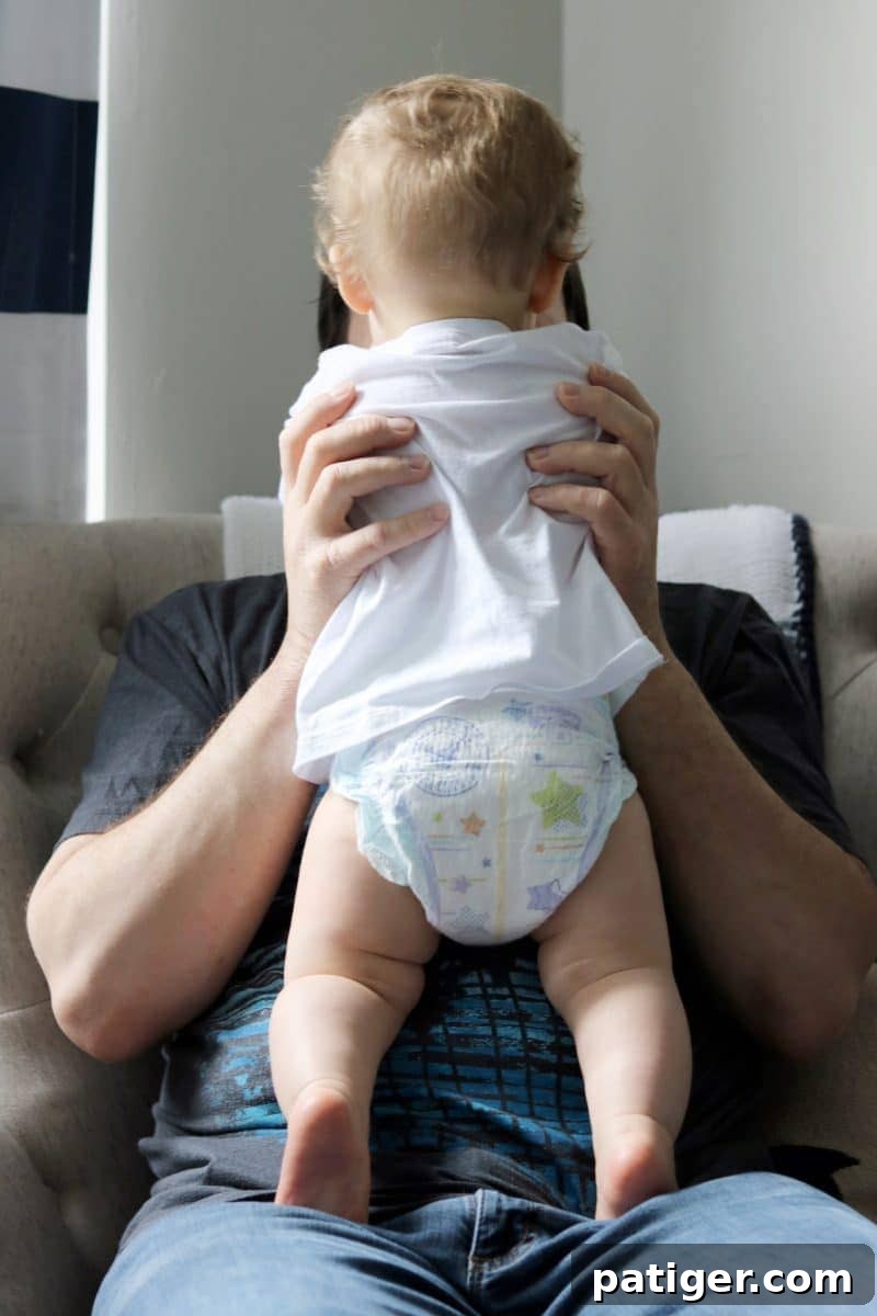 8 Heartwarming Ways to Celebrate a New Dad's First Father's Day 5 Baby's bottom wearing Huggies Little Movers diaper, ready for action