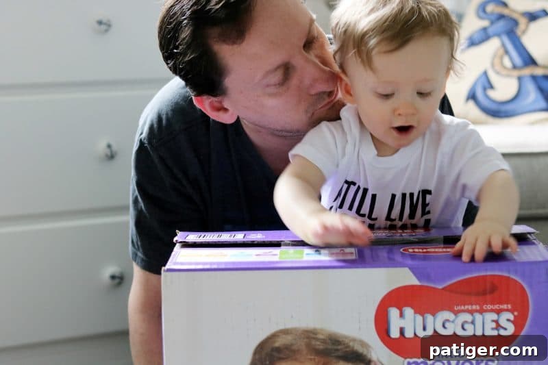 8 Heartwarming Ways to Celebrate a New Dad's First Father's Day 7 Joyful dad and baby playing together at home, creating happy memories