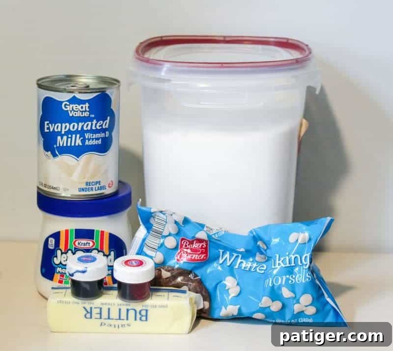 Key ingredients for Red White and Blue Fudge: Marshmallow creme, butter, granulated sugar, vibrant food coloring, white chocolate chips, and evaporated milk.