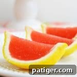 Strawberry lemonade jello shots in lemon wedges