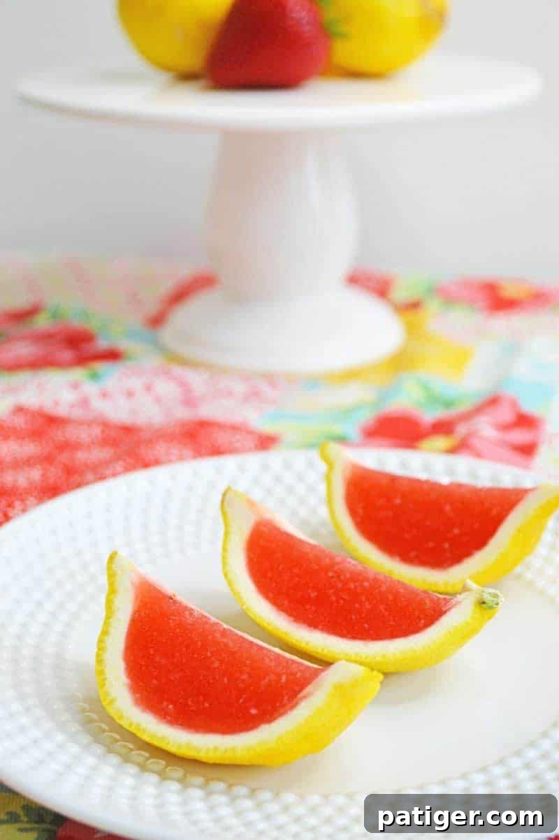 Pink Lemonade Vodka Jello Shooters 3 Strawberry lemonade jello shots made with vodka and served in lemon wedges. Don't be fooled -- these lemon wedge jello shots are actually very easy to make!