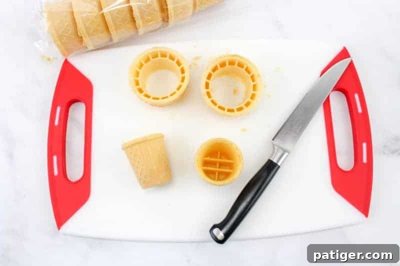 Drippy Delight Cone Cupcakes 5 The first step of melting ice cream cone cupcakes: carefully cutting the rim off a waffle cone with a sharp knife