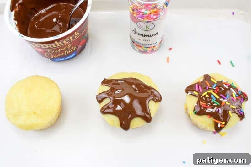 Drippy Delight Cone Cupcakes 6 Second step showing melted chocolate being spooned onto a vanilla cupcake, creating an artful drip effect