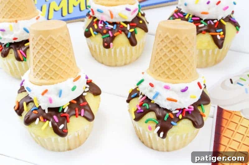 Drippy Delight Cone Cupcakes 9 Finished melting ice cream cone cupcakes arranged on a white serving tray with blue accents