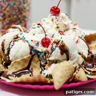 Beat the Summer Heat with This Easy Ice Cream Treat 5 Ice cream sundae on top of a bed of broken ice cream cones.