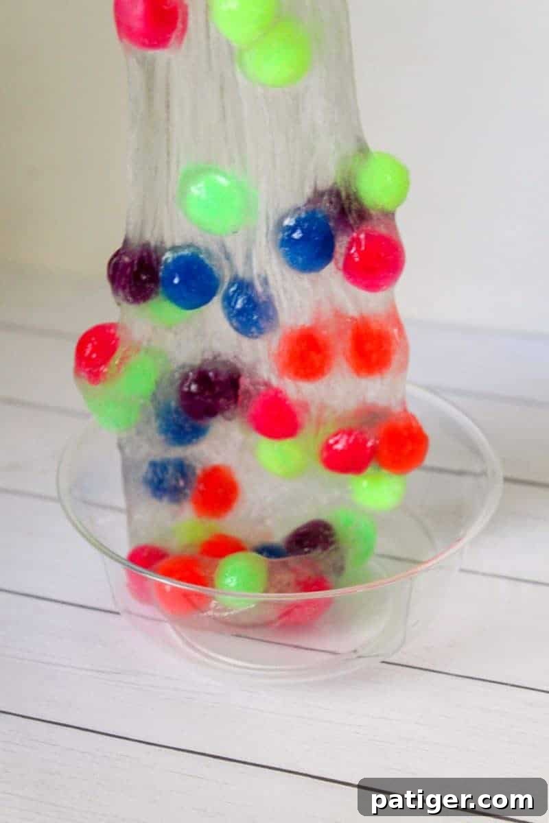 DIY Pom Pom Slime activity with kids.