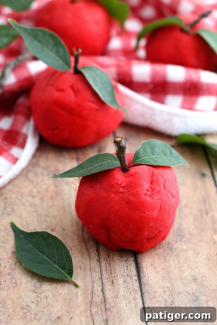 A non-toxic, taste-safe, apple scented playdough recipe perfect for Fall sensory play at home or in the classroom.