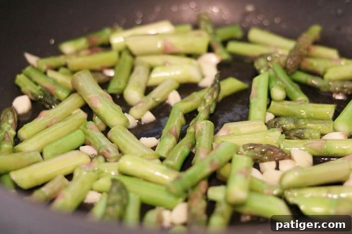 Vibrant Asparagus Whole Wheat Pasta 5 Asparagus, Garlic, and Olive Oil in Skillet