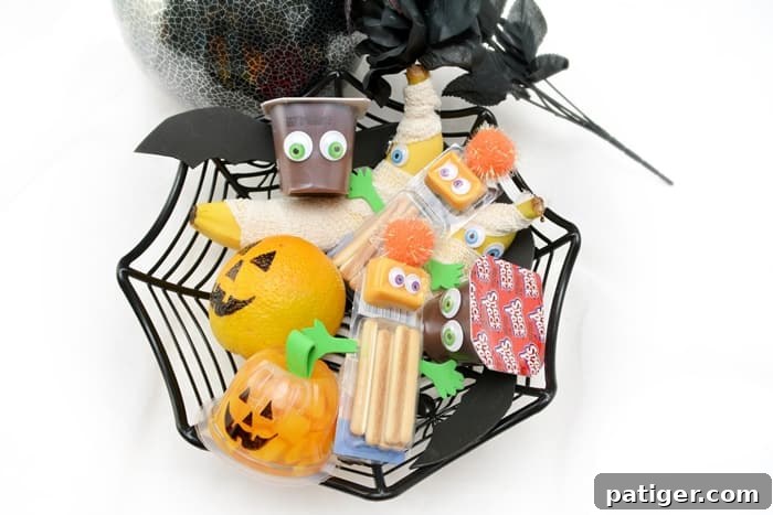 Collection of easy Halloween snacks for kids including mummy bananas, chocolate pudding bats, and monster cheese & crackers