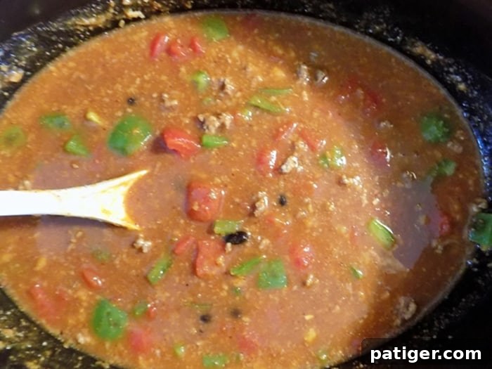 A savory Fall slow cooker Pumpkin chilli recipe perfect for warming your bones up on a cool evening.