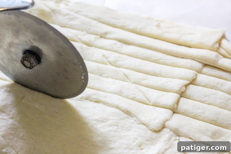 The decorating gel will be used as a "glue" to attach the eyes to the hot dog mummies when they are done baking.