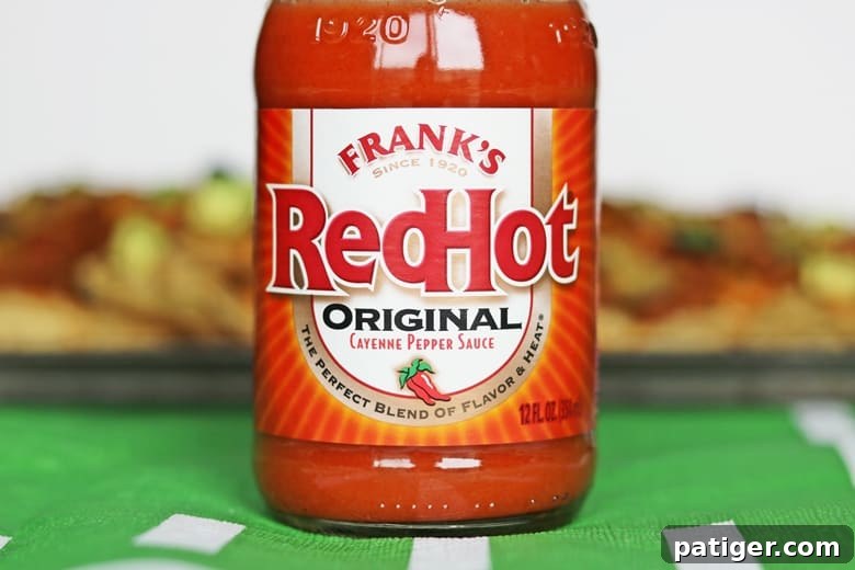 FRANK'S RedHot® Original Cayenne Pepper Sauce bottle, a classic condiment known for its perfect blend of flavor and heat, ideal for enhancing countless dishes.
