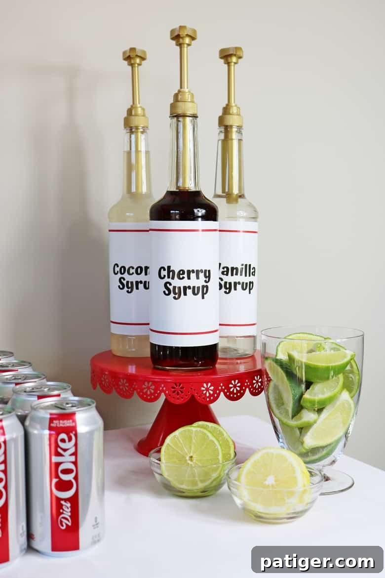 Level Up Your Party with a Custom Soda Bar 7 Assortment of vanilla, coconut, and cherry flavored syrups displayed alongside fresh lime and lemon slices, ready for custom soda creations.