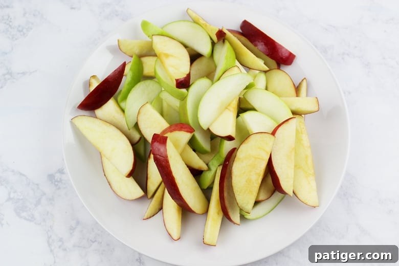 sliced apples on white plate