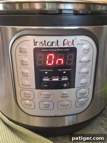 Instant Pot displaying the Sauté setting, ready for cooking.
