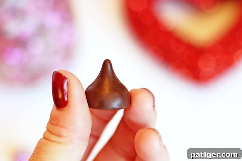 Close-up of NEW HERSHEY® Lava Cake KISSES chocolates in heart-covered foil for Valentine's Day gifts