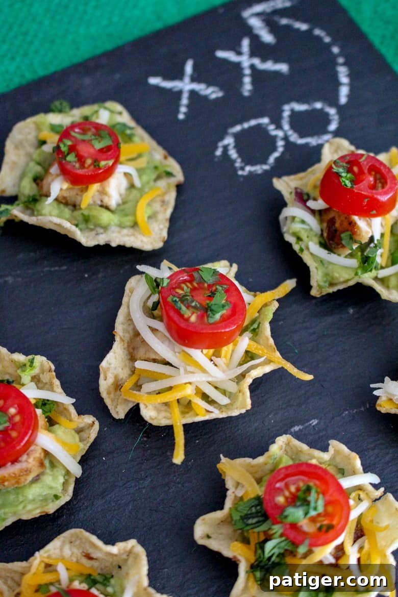 Quick Chicken Nacho Cups 2 Delicious chicken nacho bites, an easy finger food for game day or parties.