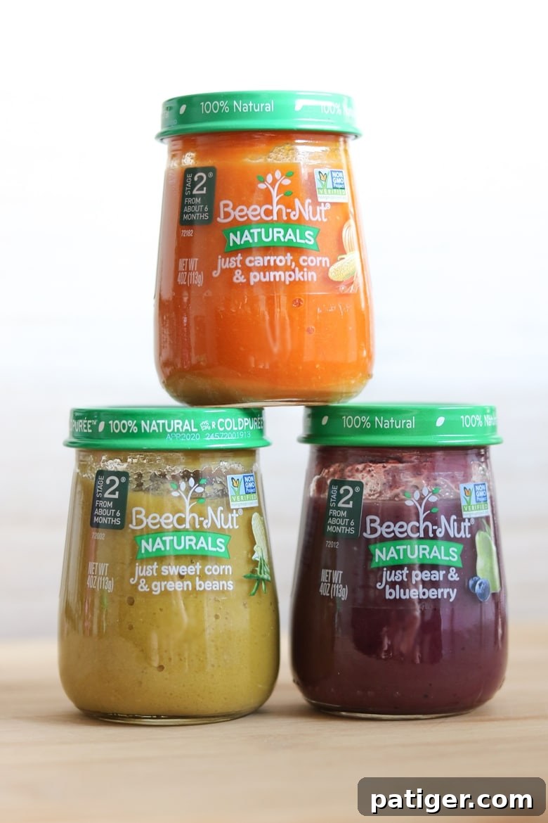 A jar of natural baby food on a wooden surface