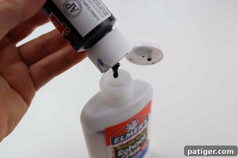 Stained Glass Style Butterfly Craft 4 Pour black paint into white glue