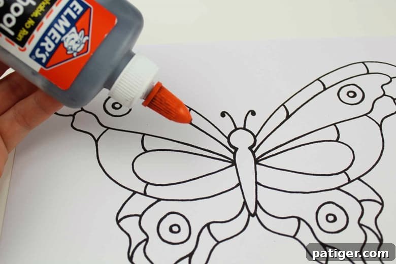 Stained Glass Style Butterfly Craft 5 tracing butterfly with black glue