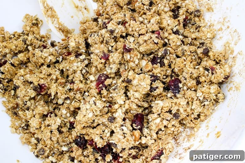 A close-up of the mixture in a bowl being stirred to combine all ingredients.