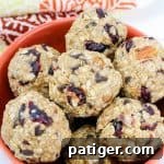 A small bowl of trail mix energy balls, perfect for a healthy snack.