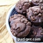 Double chocolate muffins in woven bowl