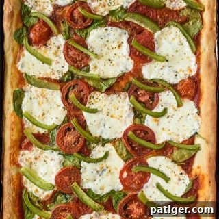 Effortless Sheet Pan Pizza 7 Sheet Pan Pizza with spinach, mozzarella, and peppers